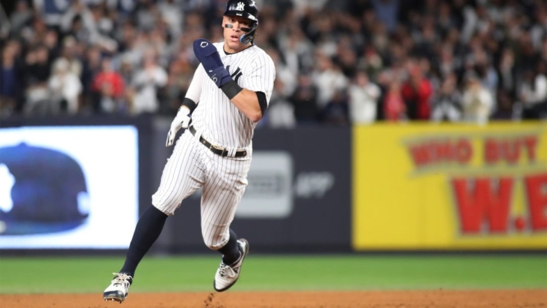 Oct 23, 2022; Bronx, New York, USA; New York Yankees center fielder Aaron Judge (99) rounds second base in the second inning against the Houston Astros during game four of the ALCS for the 2022 MLB Playoffs at Yankee Stadium. Mandatory Credit: Wendell Cruz-USA TODAY Sports