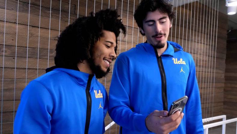 Oct 26, 2022; San Francisco, CA, USA; UCLA Bruins guard Tyger Campbell (left) and forward Jaime Jaquez Jr. react during Pac-12 Media Day at Pac-12 Network Studios. Mandatory Credit: Kirby Lee-USA TODAY Sports