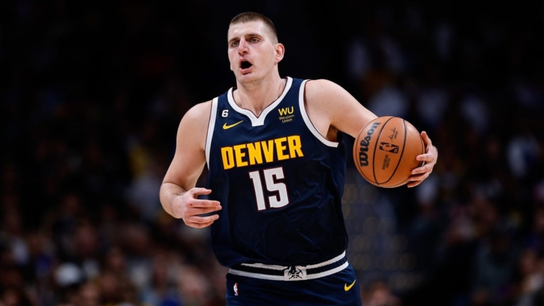 Oct 26, 2022; Denver, Colorado, USA; Denver Nuggets center Nikola Jokic (15) controls the ball in the fourth quarter against the Los Angeles Lakers at Ball Arena. Mandatory Credit: Isaiah J. Downing-USA TODAY Sports