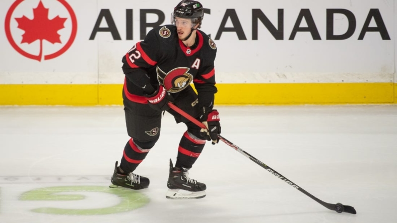 Oct 27, 2022; Ottawa, Ontario, CAN; Ottawa Senators defenseman Thomas Chabot (72) skates with the puck in the third period against the Minnesota Wild at the Canadian Tire Centre. Mandatory Credit: Marc DesRosiers-USA TODAY Sports
