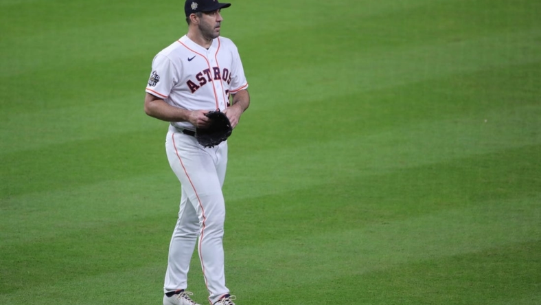 Oct 28, 2022; Houston, Texas, USA; Houston Astros starting pitcher Justin Verlander (35) walks to the dugout during the middle of first inning against the Philadelphia Phillies in game one of the 2022 World Series at Minute Maid Park. Mandatory Credit: Erik Williams-USA TODAY Sports
