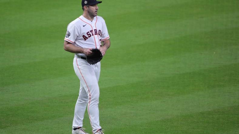 Oct 28, 2022; Houston, Texas, USA; Houston Astros starting pitcher Justin Verlander (35) walks to the dugout during the middle of first inning against the Philadelphia Phillies in game one of the 2022 World Series at Minute Maid Park. Mandatory Credit: Erik Williams-USA TODAY Sports