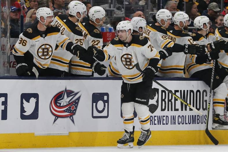 Oct 28, 2022; Columbus, Ohio, USA; Boston Bruins left wing Jake DeBrusk (74) celebrates a goal during the second period against the Columbus Blue Jackets at Nationwide Arena. Mandatory Credit: Russell LaBounty-USA TODAY Sports