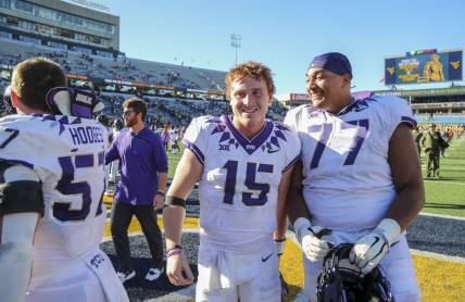 Oct 29, 2022; Morgantown, West Virginia, USA; TCU Horned Frogs quarterback Max Duggan (15) celebrates with teammates after defeating the West Virginia Mountaineers at Mountaineer Field at Milan Puskar Stadium. Mandatory Credit: Ben Queen-USA TODAY Sports