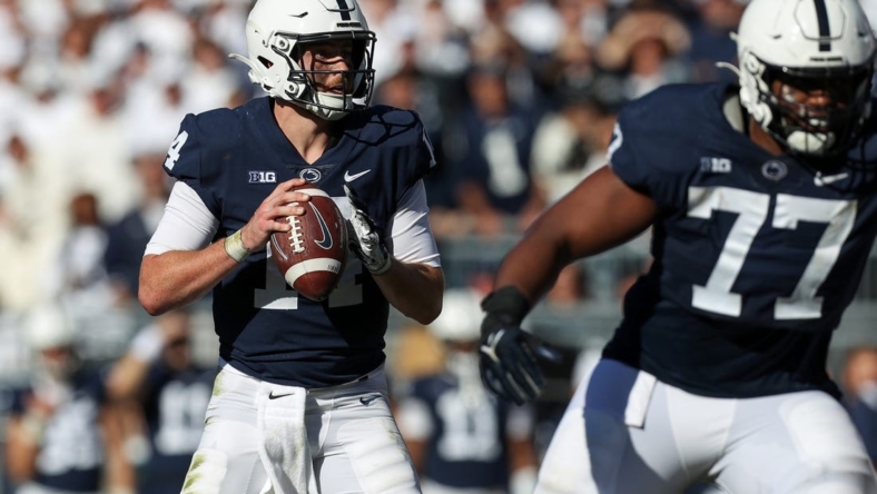 Oct 29, 2022; University Park, Pennsylvania, USA; Penn State Nittany Lions quarterback Sean Clifford (14) drops back in the pocket during the fourth quarter against the Ohio State Buckeyes at Beaver Stadium. Ohio State defeated Penn State 44-31. Mandatory Credit: Matthew OHaren-USA TODAY Sports
