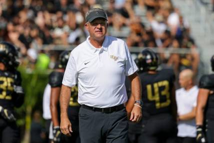 Oct 29, 2022; Orlando, Florida, USA; UCF Knights head coach Gus Malzahn on the field before the game against the Cincinnati Bearcats at FBC Mortgage Stadium. Mandatory Credit: Mike Watters-USA TODAY Sports