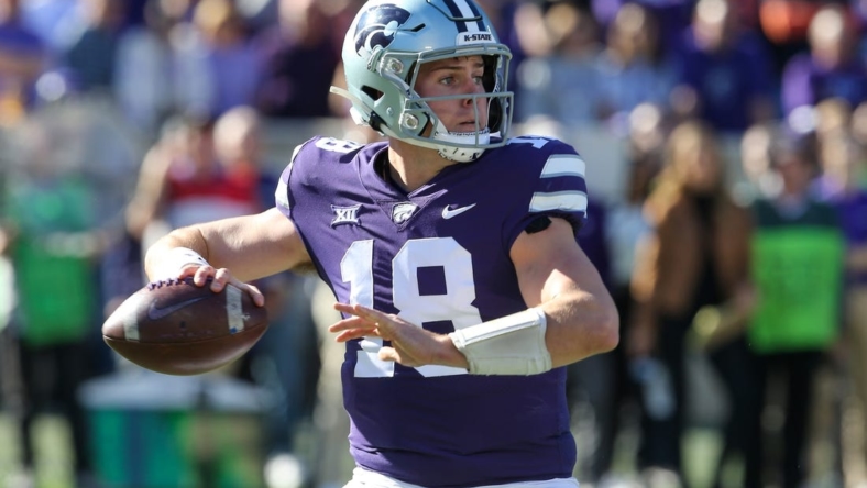 Oct 29, 2022; Manhattan, Kansas, USA; Kansas State Wildcats quarterback Will Howard (18) drops back to pass during the first quarter against the Oklahoma State Cowboys at Bill Snyder Family Football Stadium. Mandatory Credit: Scott Sewell-USA TODAY Sports