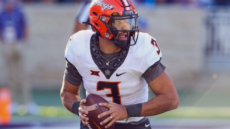 Oct 29, 2022; Manhattan, Kansas, USA; Oklahoma State Cowboys quarterback Spencer Sanders (3) drops back to pass against the Kansas State Wildcats during the first quarter at Bill Snyder Family Football Stadium. Mandatory Credit: Scott Sewell-USA TODAY Sports