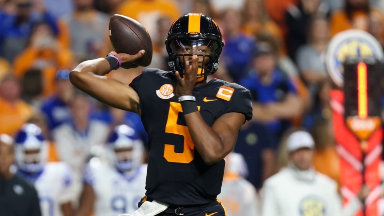 Oct 29, 2022; Knoxville, Tennessee, USA; Tennessee Volunteers quarterback Hendon Hooker (5) passes the ball against the Kentucky Wildcats during the first quarter at Neyland Stadium. Mandatory Credit: Randy Sartin-USA TODAY Sports