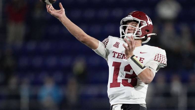 Oct 29, 2022; Annapolis, Maryland, USA; Temple Owls quarterback E.J. Warner (13) throws an interception in overtime against the Navy Midshipmen at Navy-Marine Corps Memorial Stadium. Mandatory Credit: Brent Skeen-USA TODAY Sports