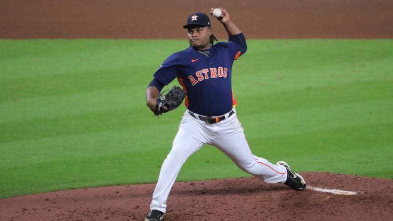 Oct 29, 2022; Houston, Texas, USA; Houston Astros starting pitcher Framber Valdez (59) throws a pitch against the Philadelphia Phillies during the fifth inning in game two of the 2022 World Series at Minute Maid Park. Mandatory Credit: Erik Williams-USA TODAY Sports