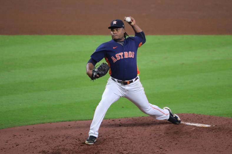 Oct 29, 2022; Houston, Texas, USA; Houston Astros starting pitcher Framber Valdez (59) throws a pitch against the Philadelphia Phillies during the fifth inning in game two of the 2022 World Series at Minute Maid Park. Mandatory Credit: Erik Williams-USA TODAY Sports