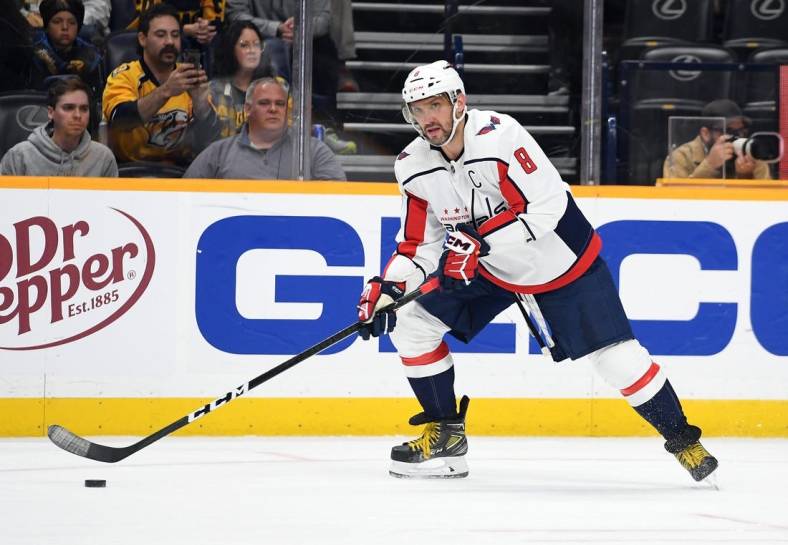 Oct 29, 2022; Nashville, Tennessee, USA; Washington Capitals left wing Alex Ovechkin (8) controls the puck against the Nashville Predators during the second period at Bridgestone Arena. Mandatory Credit: Christopher Hanewinckel-USA TODAY Sports