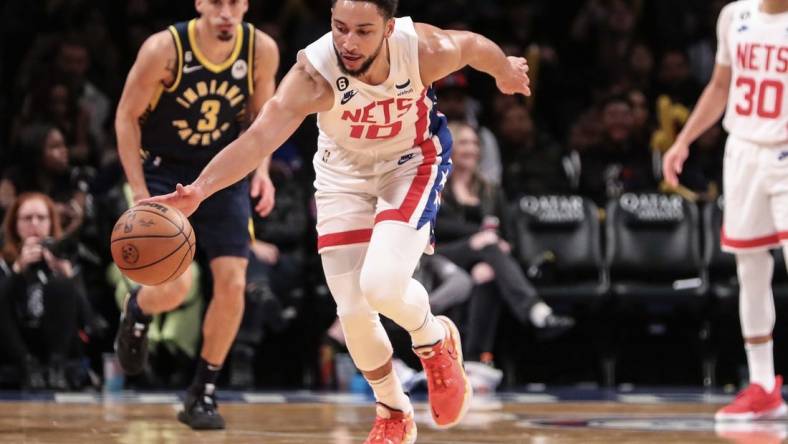 Oct 29, 2022; Brooklyn, New York, USA;  Brooklyn Nets guard Ben Simmons (10) chases a loose ball against the Indiana Pacers in the third quarter at Barclays Center. Mandatory Credit: Wendell Cruz-USA TODAY Sports