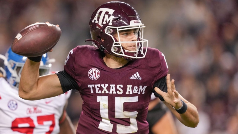 Oct 29, 2022; College Station, Texas, USA;  Texas A&M Aggies quarterback Conner Weigman (15) throws a pass against the Mississippi Rebels in the second half at Kyle Field. Mandatory Credit: Daniel Dunn-USA TODAY Sports