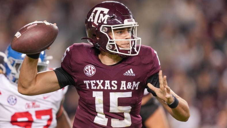 Oct 29, 2022; College Station, Texas, USA;  Texas A&M Aggies quarterback Conner Weigman (15) throws a pass against the Mississippi Rebels in the second half at Kyle Field. Mandatory Credit: Daniel Dunn-USA TODAY Sports