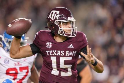 Oct 29, 2022; College Station, Texas, USA;  Texas A&M Aggies quarterback Conner Weigman (15) throws a pass against the Mississippi Rebels in the second half at Kyle Field. Mandatory Credit: Daniel Dunn-USA TODAY Sports