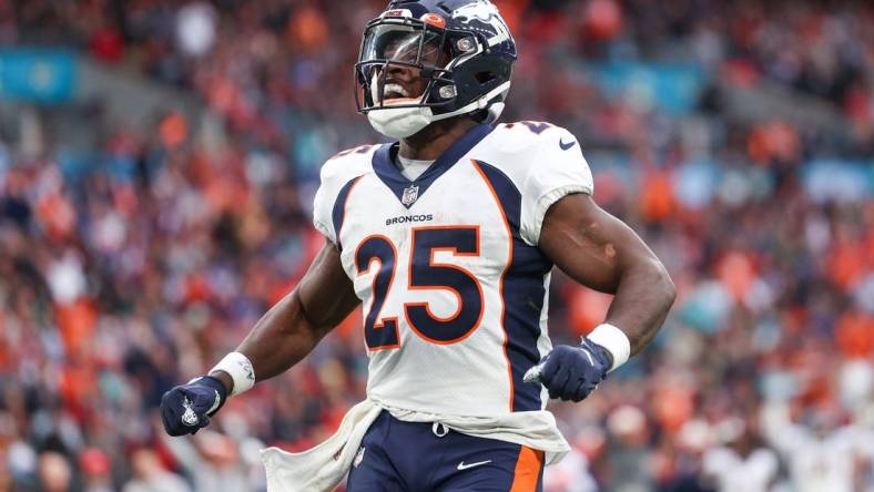 Oct 30, 2022; London, United Kingdom, Denver Broncos running back Melvin Gordon III (25) reacts after scoring a touchdown against the Jacksonville Jaguars in the third quarter during an NFL International Series game at Wembley Stadium. Mandatory Credit: Nathan Ray Seebeck-USA TODAY Sports