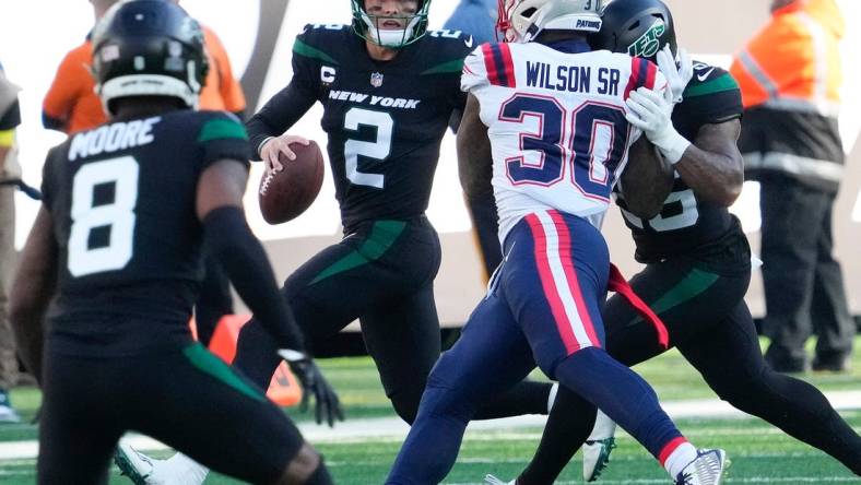 Oct 30, 2022; East Rutherford,NJ, USA;  New York Jets quarterback Zach Wilson (2) scrambling in the second half against the New England Patriots at MetLife Stadium. Mandatory Credit: Robert Deutsch-USA TODAY Sports