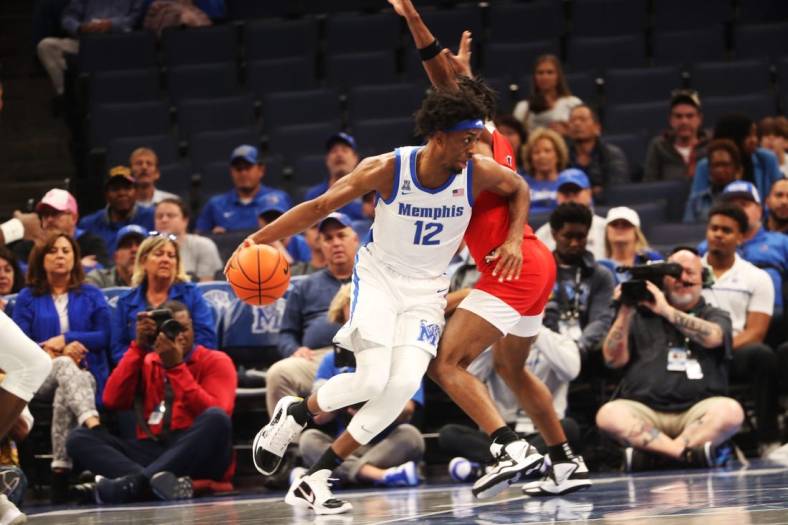 Memphis Tigers' DeAndre Williams looks to make a play during a game against Lane College defense on Oct. 30, 2022 at the Fedex Forum in Memphis.

Memphis Tigers' DeAndre Willimas looks to make a play during a game against Lane College defense on Oct. 30, 2022 at the Fedex Forum in Memphis.