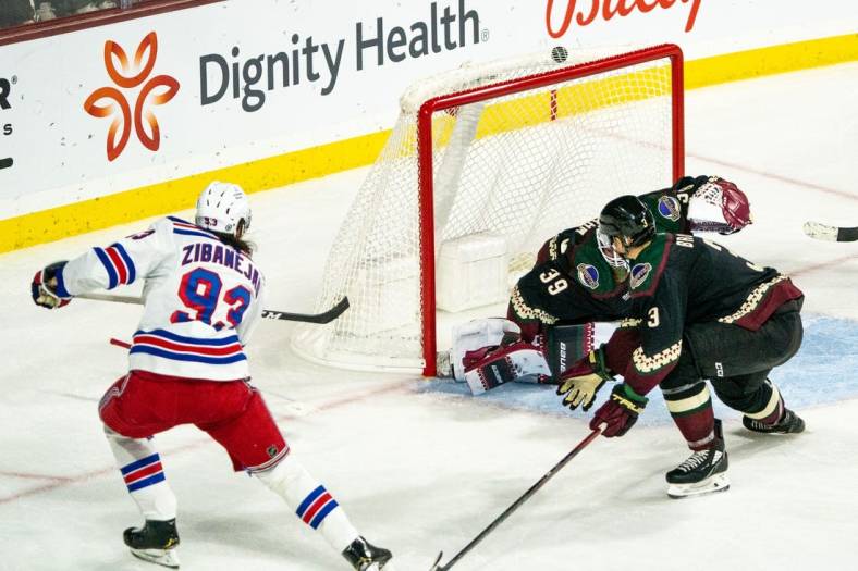 Oct 30, 2022; Tempe, Arizona, USA; New York Rangers forward Mika Zibanejad (93) scores against the Arizona Coyotes during the third period at Mullett Arena. Mandatory Credit: Allan Henry-USA TODAY Sports