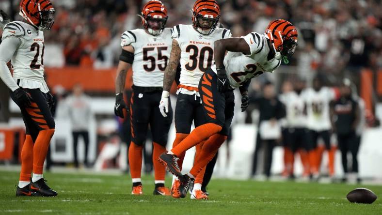 Oct 31, 2022; Cincinnati, OH, USA; Cincinnati Bengals cornerback Chidobe Awuzie (22) limps off the field in the second quarter during an NFL Week 8 game against the Cleveland Browns, Monday, Oct. 31, 2022, at FirstEnergy Stadium in Cleveland.  Mandatory Credit: Albert Cesare-USA TODAY Sports