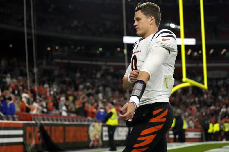 Oct 31, 2022; Cincinnati, OH, USA; Cincinnati Bengals quarterback Joe Burrow (9) walks off the field at the conclusion of the fourth quarter following a loss to the Cleveland Browns during an NFL Week 8 game, Monday, Oct. 31, 2022, at FirstEnergy Stadium in Cleveland.  Mandatory Credit: Albert Cesare-USA TODAY Sports