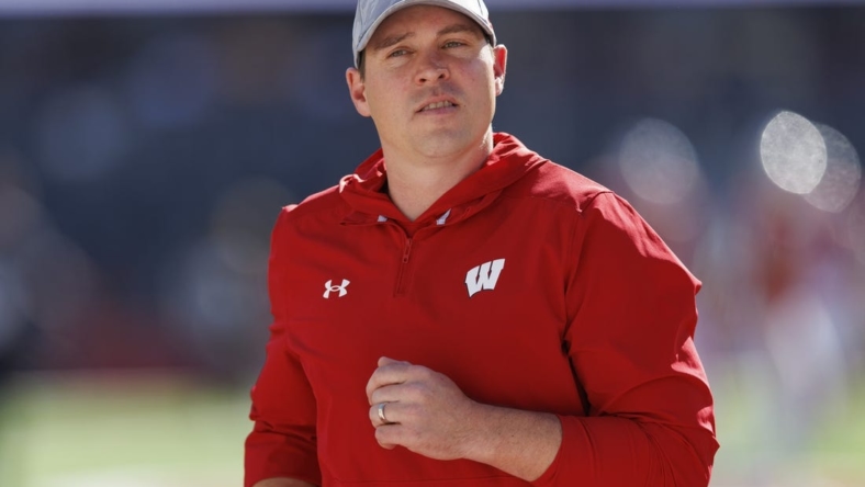 Oct 22, 2022; Madison, Wisconsin, USA;  Wisconsin Badgers head coach Jim Leonhard during warmups prior to the game against the Purdue Boilermakers at Camp Randall Stadium. Mandatory Credit: Jeff Hanisch-USA TODAY Sports