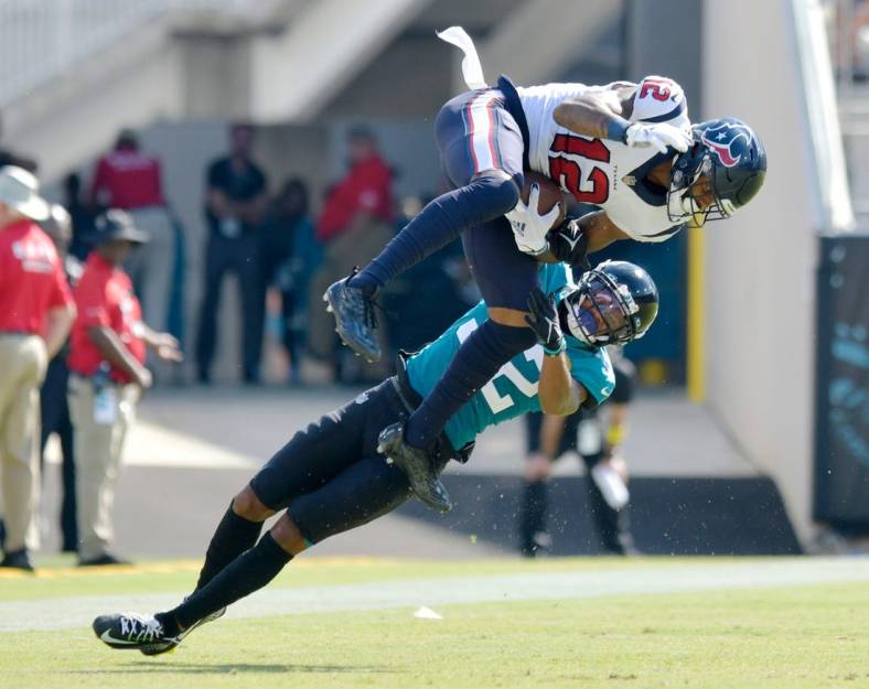 Jacksonville Jaguars cornerback Tyson Campbell (32) tries to defend a pass play against Houston Texans wide receiver Nico Collins (12) during fourth quarter action. Campbell was penalized for pass interference on the play. The Jacksonville Jaguars hosted the Houston Texans at TIAA Bank Field in Jacksonville, FL Sunday, October 9, 2022. The Jaguars fell to the Texans with a final score of 13 to 6.

Jki 101022 Bs Jaguars Vs Texans 20