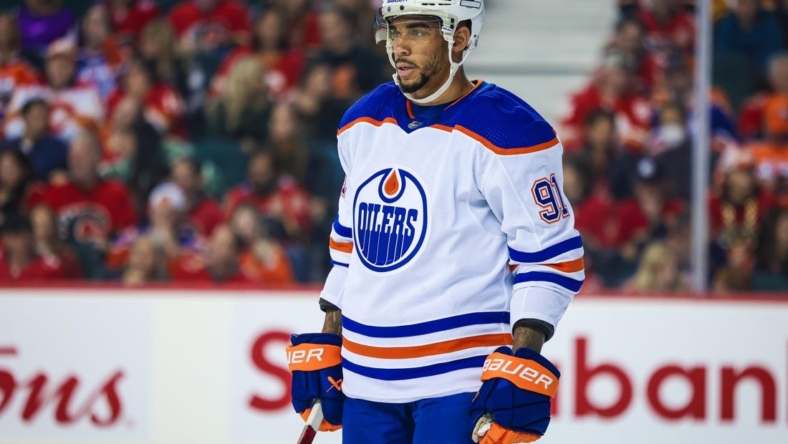 Oct 29, 2022; Calgary, Alberta, CAN; Edmonton Oilers left wing Evander Kane (91) against the Calgary Flames during the first period at Scotiabank Saddledome. Mandatory Credit: Sergei Belski-USA TODAY Sports