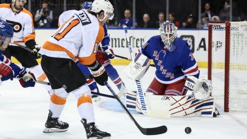 Nov 1, 2022; New York, New York, USA;  New York Rangers goaltender Igor Shesterkin (31) watches as Philadelphia Flyers right wing Travis Konecny (11) controls the puck in the first period at Madison Square Garden. Mandatory Credit: Wendell Cruz-USA TODAY Sports