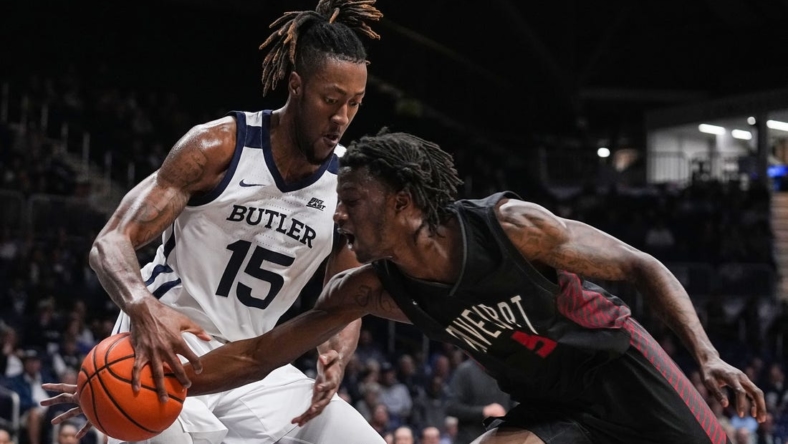 Butler Bulldogs center Manny Bates (15) grabs the ball from Davenport Panthers Marcedus Leech Jr. (5) on Tuesday, Nov. 1, 2022, at Hinkle Fieldhouse in Indianapolis. The Butler Bulldogs lead at the half agains the Davenport Panthers.

Ncaa Basketball Butler Basketball Vs Davenport Exhibition Davenport At Butler Bulldogs
