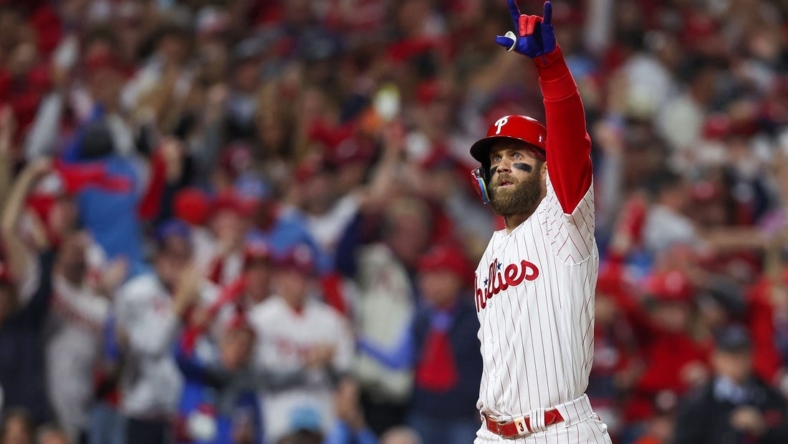 Nov 1, 2022; Philadelphia, PA, USA; Philadelphia Phillies designated hitter Bryce Harper (3) reacts after hitting a two run home run against the Houston Astros during the first inning in game three of the 2022 World Series at Citizens Bank Park. Mandatory Credit: Bill Streicher-USA TODAY Sports