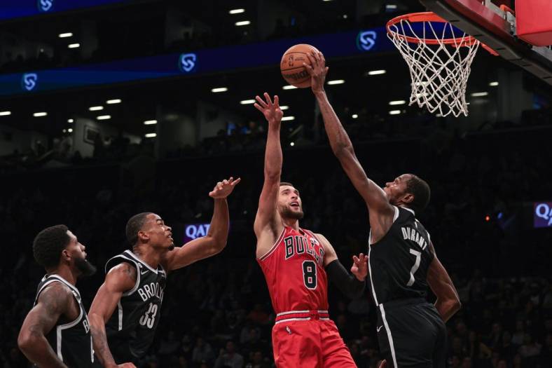 Nov 1, 2022; Brooklyn, New York, USA; Brooklyn Nets forward Kevin Durant (7) blocks a shot by Chicago Bulls guard Zach LaVine (8) during the second half at Barclays Center. Mandatory Credit: Vincent Carchietta-USA TODAY Sports
