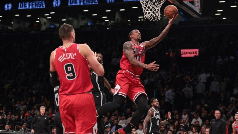 Nov 1, 2022; Brooklyn, New York, USA; Chicago Bulls forward DeMar DeRozan (11) drives to the basket against the Brooklyn Nets during the second half at Barclays Center. Mandatory Credit: Vincent Carchietta-USA TODAY Sports