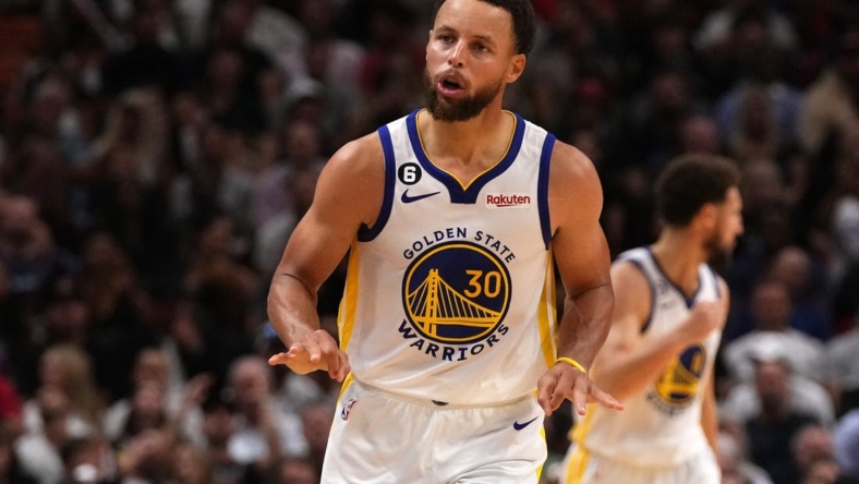 Nov 1, 2022; Miami, Florida, USA; Golden State Warriors guard Stephen Curry (30) gestures after making a three point basket against the Miami Heat during the second half at FTX Arena. Mandatory Credit: Jasen Vinlove-USA TODAY Sports