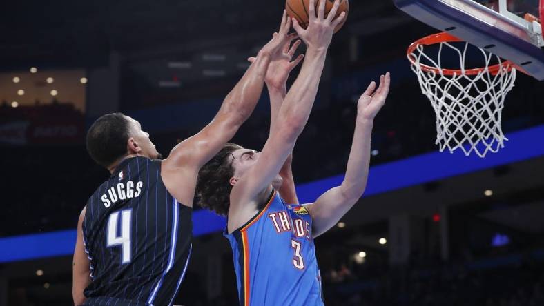 Nov 1, 2022; Oklahoma City, Oklahoma, USA; Oklahoma City Thunder guard Josh Giddey (3) goes to the basket as Orlando Magic guard Jalen Suggs (4) defends during the second half at Paycom Center. Oklahoma City won 116-108. Mandatory Credit: Alonzo Adams-USA TODAY Sports