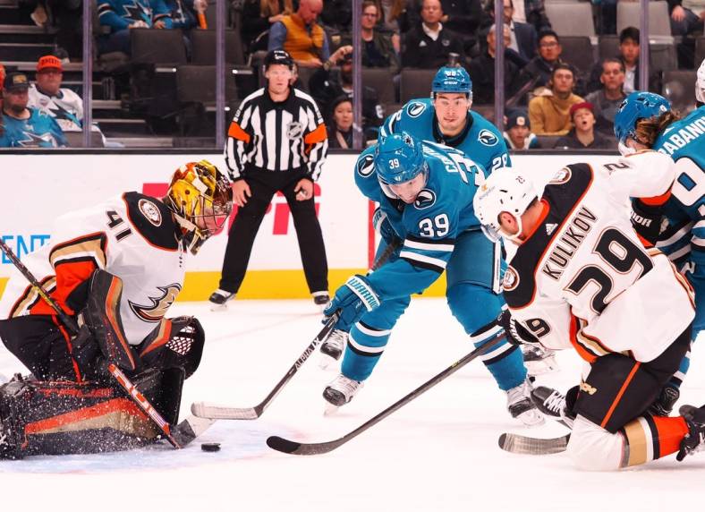 Nov 1, 2022; San Jose, California, USA; Anaheim Ducks goalie Anthony Stolarz (41) defends the goal with defenseman Dmitry Kulikov (29) against San Jose Sharks center Logan Couture (39) and left wing Alexander Barabanov (94) during the second period at SAP Center at San Jose. Mandatory Credit: Kelley L Cox-USA TODAY Sports