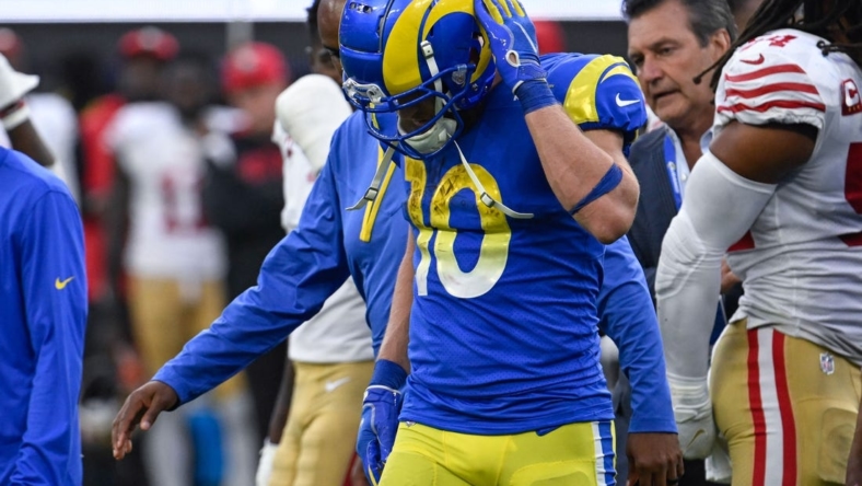 Oct 30, 2022; Inglewood, California, USA; Los Angeles Rams wide receiver Cooper Kupp (10) walks off the field after sustaining an injury in the fourth quarter against the San Francisco 49ers at SoFi Stadium. Mandatory Credit: Robert Hanashiro-USA TODAY Sports