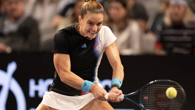 Nov 2, 2022; Forth Worth, TX, USA; Maria Sakkari (GRE) returns a shot during her match against Aryna Sabalenka (BLR) on day three of the WTA Finals at Dickies Arena. Mandatory Credit: Susan Mullane-USA TODAY Sports