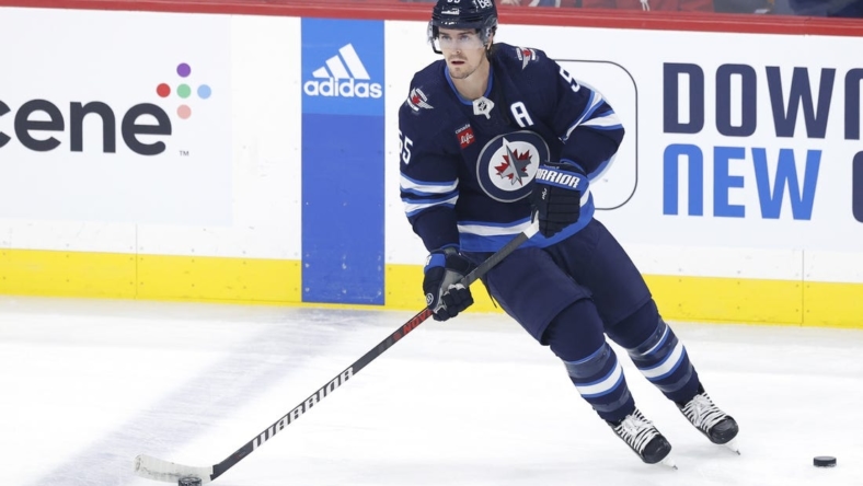 Nov 3, 2022; Winnipeg, Manitoba, CAN; Winnipeg Jets center Mark Scheifele (55) warms up before a game against the Montreal Canadiens at Canada Life Centre. Mandatory Credit: James Carey Lauder-USA TODAY Sports