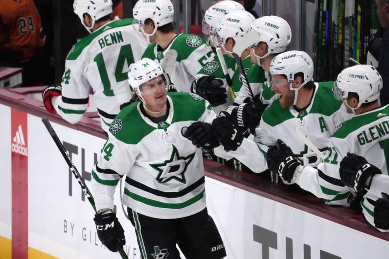 Nov 3, 2022; Tempe, Arizona, USA; Dallas Stars right wing Denis Gurianov (34) celebrates a goal against the Arizona Coyotes during the first period at Mullett Arena. Mandatory Credit: Joe Camporeale-USA TODAY Sports