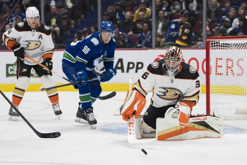 Nov 3, 2022; Vancouver, British Columbia, CAN; Vancouver Canucks forward Andrei Kuzmenko (96) looks on as Anaheim Ducks goalie John Gibson (36) makes a save in the first period at Rogers Arena. Mandatory Credit: Bob Frid-USA TODAY Sports