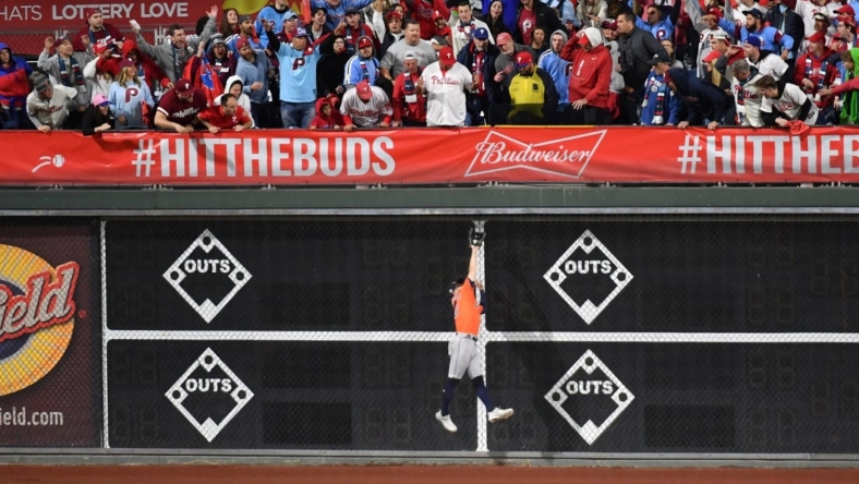 Nov 3, 2022; Philadelphia, Pennsylvania, USA; Houston Astros left fielder Chas McCormick (20) makes a catch on the fly ball hit by Philadelphia Phillies catcher J.T. Realmuto (not pictured) for the second out during the eighth inning in game five of the 2022 World Series at Citizens Bank Park. Mandatory Credit: Eric Hartline-USA TODAY Sports