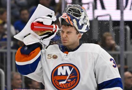 Nov 3, 2022; St. Louis, Missouri, USA;  New York Islanders goaltender Ilya Sorokin (30) sprays water on his face during the second period against the St. Louis Blues at Enterprise Center. Mandatory Credit: Jeff Curry-USA TODAY Sports