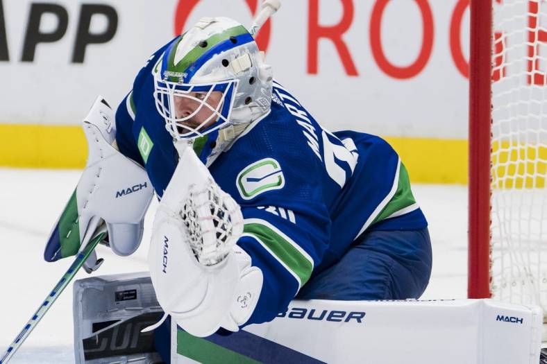 Nov 3, 2022; Vancouver, British Columbia, CAN; Vancouver Canucks goalie Spencer Martin (30) makes a save against the Anaheim Ducks in the second period at Rogers Arena. Mandatory Credit: Bob Frid-USA TODAY Sports
