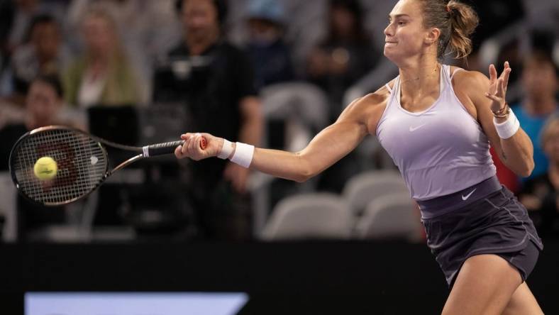 Nov 4, 2022; Forth Worth, TX, USA; Aryna Sabalenka returns a shot during her match against Jessica Pegula (USA) on day five of the WTA Finals at Dickies Arena. Mandatory Credit: Susan Mullane-USA TODAY Sports