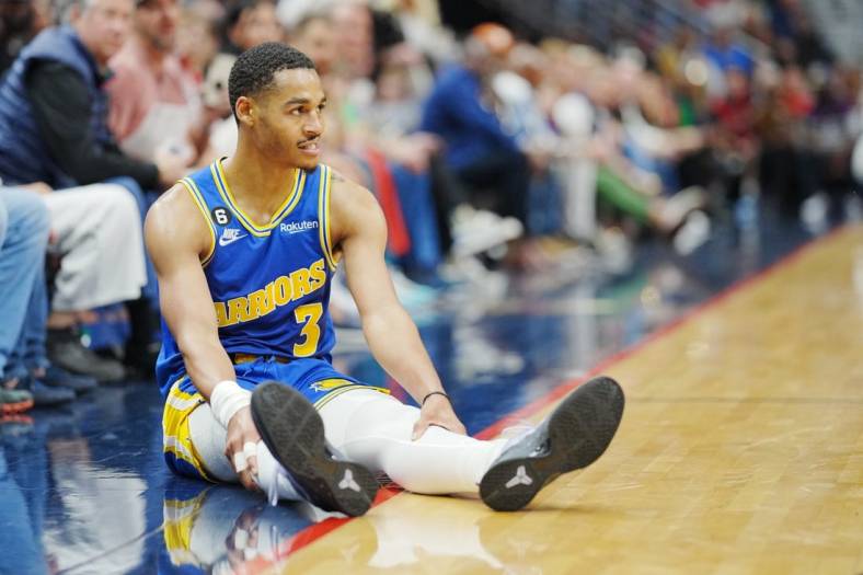 Nov 4, 2022; New Orleans, Louisiana, USA; Golden State Warriors guard Jordan Poole (3) reacts after a foul against the New Orleans Pelicans during the first quarter at Smoothie King Center. Mandatory Credit: Andrew Wevers-USA TODAY Sports