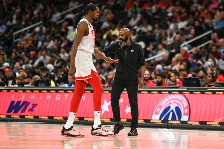 Nov 4, 2022; Washington, District of Columbia, USA;Brooklyn Nets interim head coach Jacque Vaughn high fives  forward Kevin Durant (7)   during the second half against the Washington Wizards at Capital One Arena. Mandatory Credit: Tommy Gilligan-USA TODAY Sports
