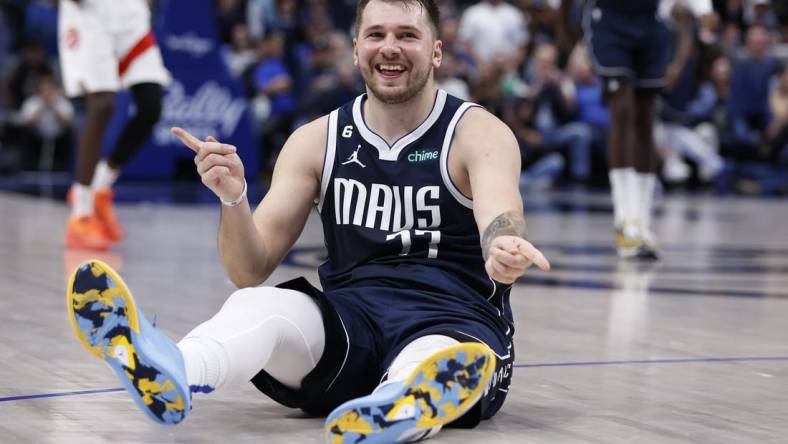 Nov 4, 2022; Dallas, Texas, USA;  Dallas Mavericks guard Luka Doncic (77) reacts after making a basket in the second half against the Toronto Raptors at American Airlines Center. Mandatory Credit: Tim Heitman-USA TODAY Sports